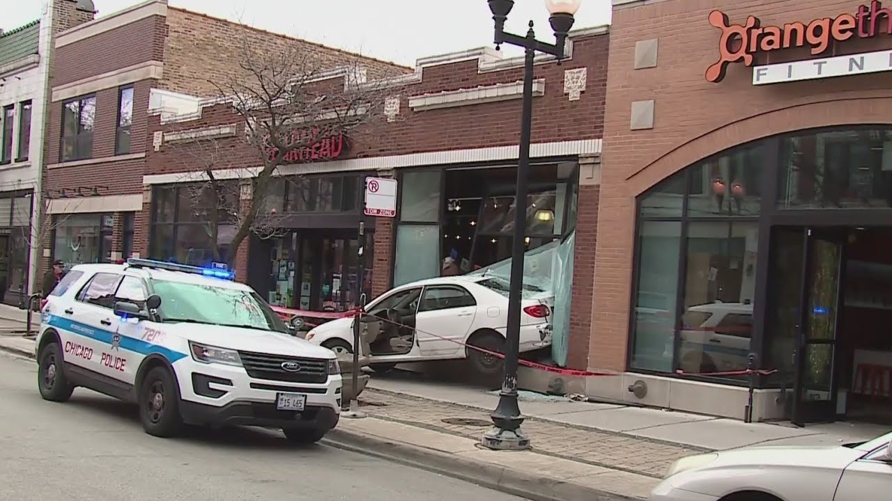 No injuries reported after car crashes into Lincoln Square storefront ...