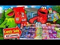 Kermit the Frog and Elmo Buy 300 Pounds of Halloween Candy!