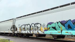 WB CSX with CP power leading the way great mixed freight crew and graffiti. Also long train. Enjoy. 