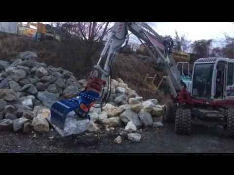 Takeuchi TB175W mit Trevi Benne PMG 08 Abbruch/Sortiergreifer