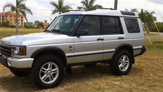 Demo Drive and Walkaround Presentation of a Lifted 2003 Land Rover Discovery SE
