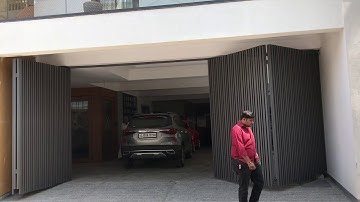 Underground swing folding gate automation at Althan done by Krishna home automation +919016042525