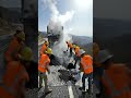 Repairing a road on a cliff under extreme conditions #Potholerepair #infrastructure #RoadMaintenance