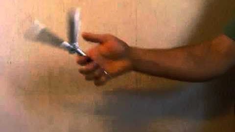 Balisong butterfly knife trick double index rollover