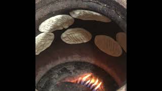 MAKING NAAN BREAD IN TANDOOR | PAKISTANI INDIAN GARLIC BREAD | #Shorts