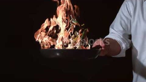 slow motion shot of chef with flaming stir fry shot on phantom flex 4k at 1000 fps vjs vsmr  PM