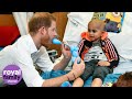 Duke of Sussex plays with balloon animals at Oxford Children’s Hospital