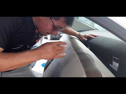 Vídeo: Como você coloca os bancos traseiros para baixo em um Chevy Cobalt 2010?