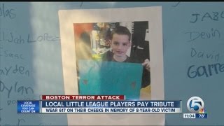 Local little league players pay tribute