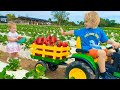 Chris and Mom learn to harvest berries at the farm