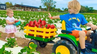 chris and mom learn to harvest berries at the farm