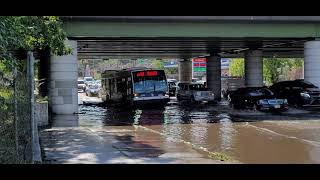 MTA Bus BX28 Passing Through Flood Waters On Bartow Ave In Coop City, The Bronx, New York City