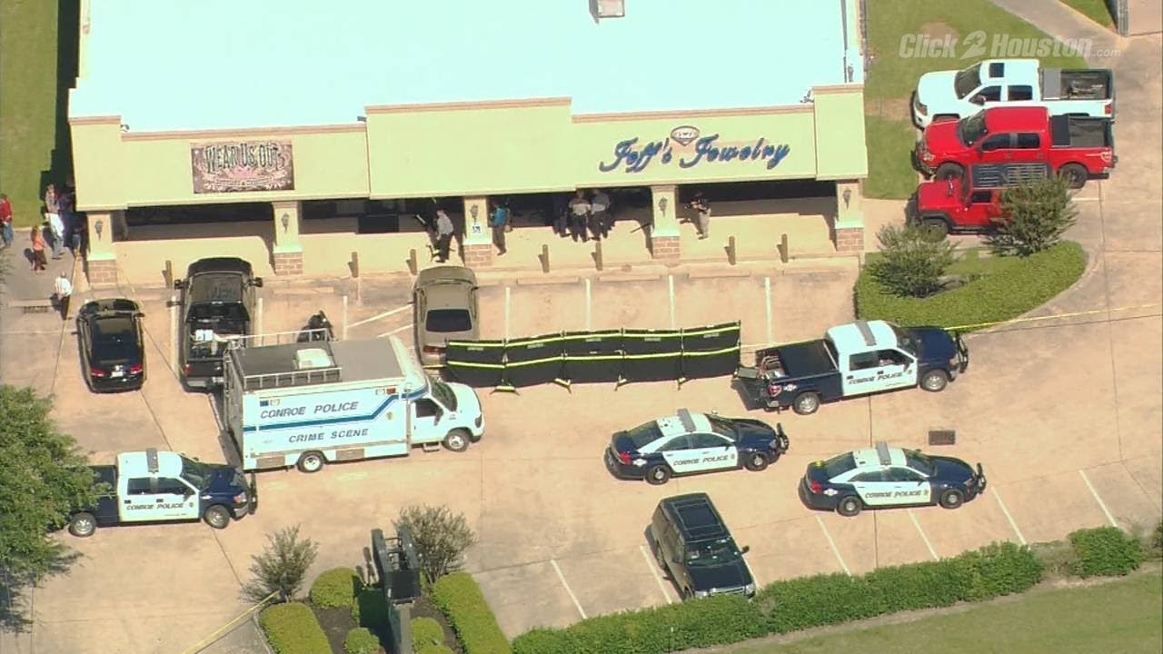 Suspect killed in jewelry store robbery - YouTube
