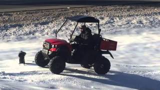 Hammerhead R-150 utility vehicle joyriding in snow and ice