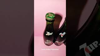 My collection: 7up bottle w/ fido dido crown