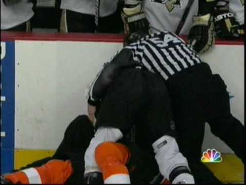 Chris Kunitz hits Kimmo Timonen