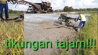 Traktor sawah awas tikungan tajam