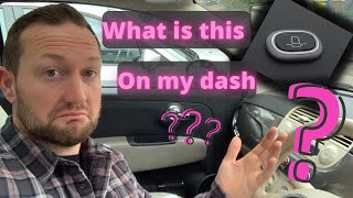 What is the spring loaded pushy thing on the dash of a Fiat 500 ??