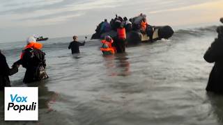 Small Boat Migrants PHYSICALLY ASSAULT Journalist On Camera
