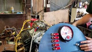 Rebuilt 5.7 Vortec on running engine stand (Open Headers)