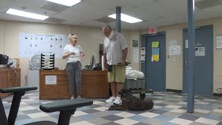 Correctional center helps train service dog for farmer in need