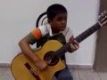 Argentinian boy playing guitar     