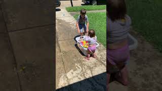Water balloon hit girl in back of head