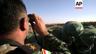 Small bridge separates Peshmerga and IS militants fighting on the frontline