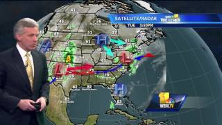 Rain clears for breezy, mild day Wednesday