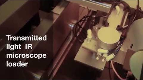 Wafer loader for IR transmitted light microscope.