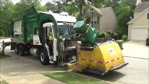 Waste Management- Peterbilt 520 Heil Front Loader with Curotto Can
