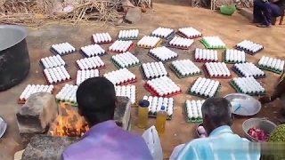شاهد طريقة هذا الهندي في طبخ 1000 بيضة 