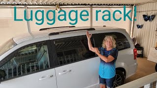 Installing the side rails on the roof of my Dodge Grand Caravan for luggage rack