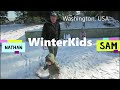Winterkids sam and nathan active outside during winter