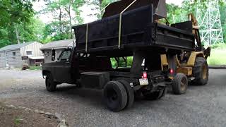 removing dump truck bed for some maintenance