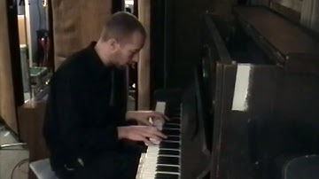 Chris Martin writing The Scientist