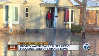 Water Main break floods neighborhood