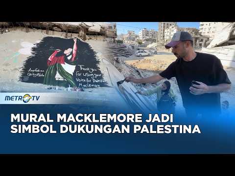Seniman Gaza Lukis Wajah Macklemore di Tengah Reruntuhan