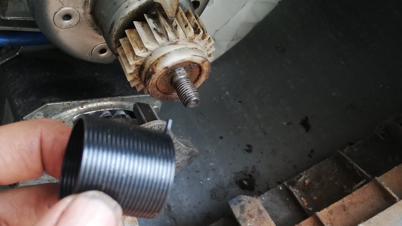 COMO  CAMBIO  EL RESORTE DEL PIÑÓN  DE UNA TRANSMISION DE UNA LAVADORA. VIDEO 2