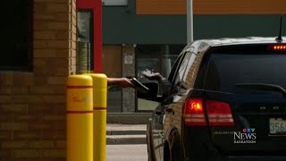 Driver in Sask. ticketed by police for using food-ordering app on phone in drive-thru line screenshot 1