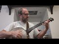 Hook and line clawhammer banjo