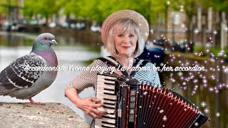 "La Paloma" (Cha-cha-cha) on her 48-basser accordion. chords