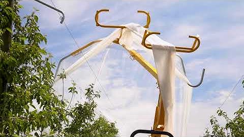 Drape Net Install with Net Wizz Applicator Utilizing a 3-point Tractor Attachment