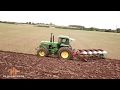 John Deere 4955 ploughing