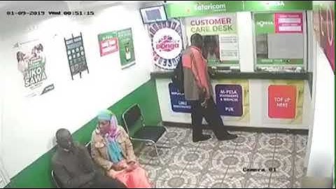 Kenyan Robbbers Caught on Camera Violently Robbing an M-Pesa Shop in Nairobi