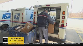 Postal service employees tackling the holiday rush as shipping deadlines loom