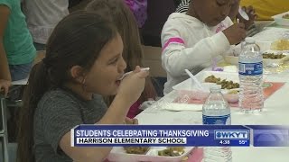Volunteers serve Thanksgiving dinner to Lexington elementary students
