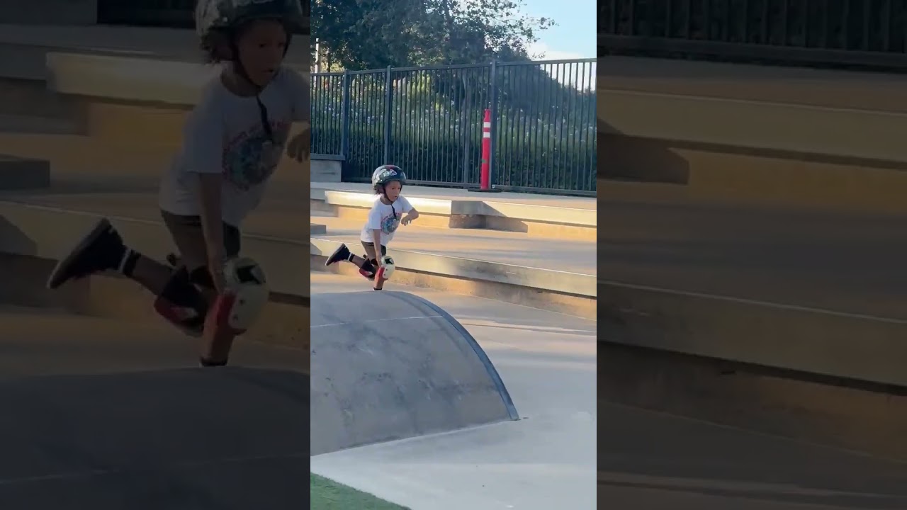 Boy in helmet rides skateboard then trips and faceplants at skatepark