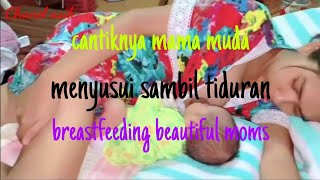 mama muda menyusui. sambil tiduran cantik banget. breastfeeding baby beautiful moms