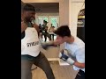 Francis Ngannou taking body shots from Ryan Garcia.